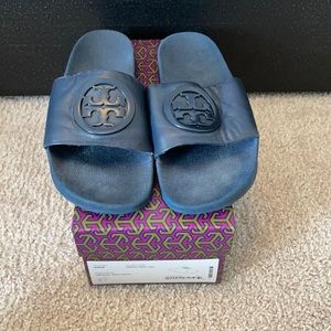 Tory Burch navy blue slides.